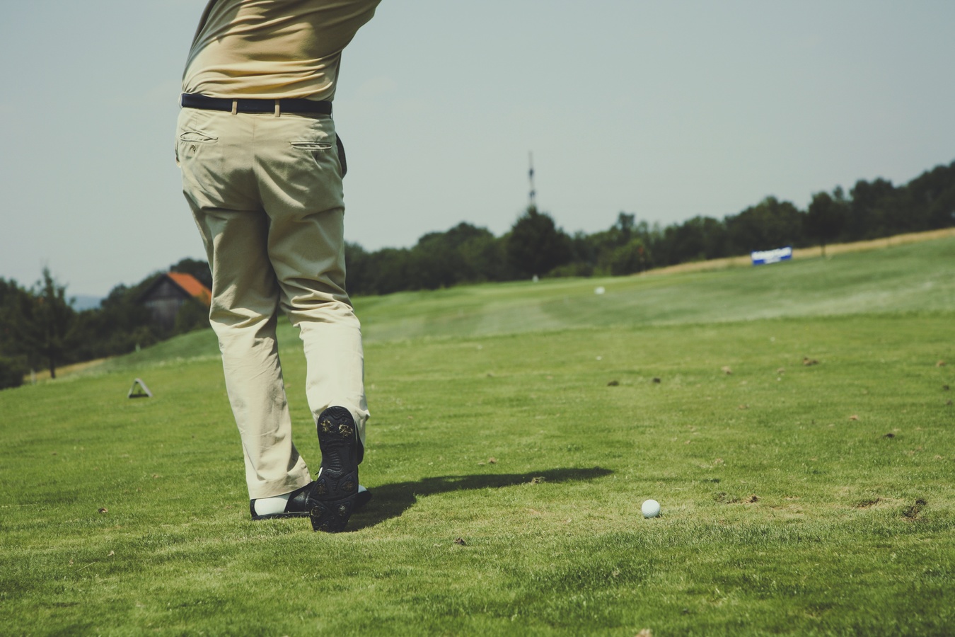 hitting a golf ball